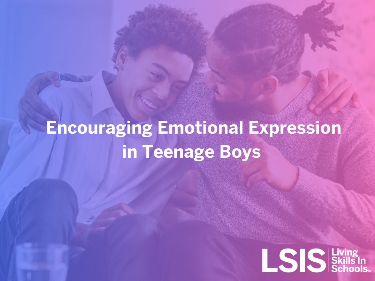 The image features two individuals sitting closely together, with one person having their arm around the other in a supportive manner. The background is a gradient of blue and pink hues. The text in the center of the image reads 'Encouraging Emotional Expression in Teenage Boys.' In the bottom right corner, there is a logo with the letters 'LSIS' and the words 'Living Skills In Schools.' The overall tone of the image is warm and supportive, emphasizing emotional connection and expression.